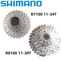 Shimano 105 R7100 Ultegra R8100 12ความเร็วจักรยานท้องถนนเทป CS-R7100 11-34T 11-36T CS-R8100 11-30T 11-34T Cogs ร้านจักรยานอุปกรณ์เสริมจักรยานเดิม