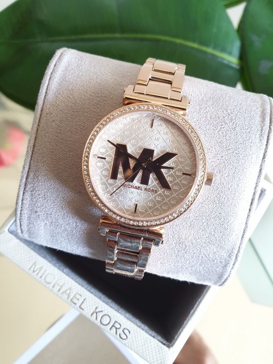 Buy the Womens MK-4335 Sofie Rose Gold Crystal Round Quartz Analog