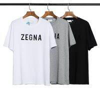 เสื้อยืดแขนสั้นทรงหลวมมีตัวอักษรลาย FEAR OF GOD ZEGNA สำหรับทั้งหญิงและชายแฟชั่นอเมริกัน