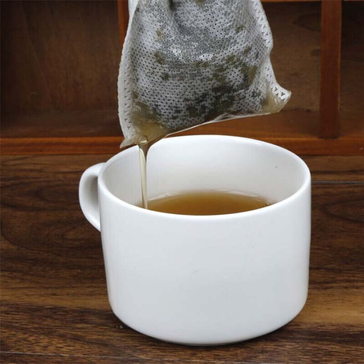 ถุงกรองชา-ถุงใส่ชา-ถุงใส่ใบชา-ถุงกรองชาสมุนไพร-ถุงกระดาษกรอง-ถุงกรองชาสมุนไพร-100-ชิ้น-ซองชาเยื่อกระดาษ-พร้อมเชือกหูรูด-tea-bag-simplefood