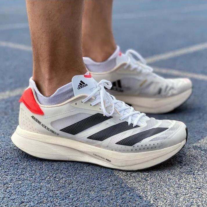adidas adios carbon plate
