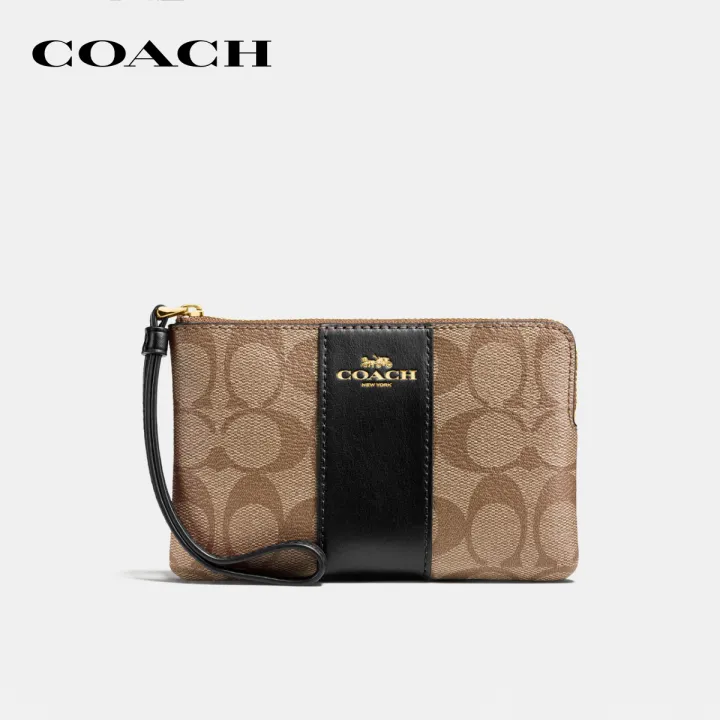 COACH กระเป๋าคล้องมือขนาดเล็กผู้หญิงรุ่น Corner Zip Wristlet In Signature Canvas สีครีม 58035IMCBI