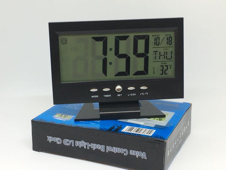 นาฬิกาตั้งโต๊ะแสดงอุณหภูมิ-4in1-voice-control-back-light-lcd-clock-มีแสงไฟชนิดเซ็นเซอร์-แสดงอุณหภูมิได้-ตั้งปลุกเสียงดนตรี-8แบบ-ปฏิทิน-100ปี-ใช้ถ่านไฟฉาย