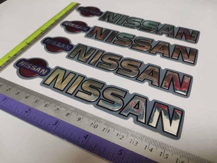 สติ๊กเกอร์ฟอยด์-ปั๊มนูน-คำว่า-nissan-ติดรถ-แต่งรถ-นิสสัน-sticker-สวย-งานดี-หายาก-ถูกและดี-ติดท้ายรถ-ติดประตูรถ-ติดข้างรถ