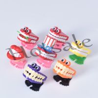 【hot sale】 ▧✱ B32 HOT Funny Jumping Teeth Chattering Smile Teeth Small Wind Up Feet Toy