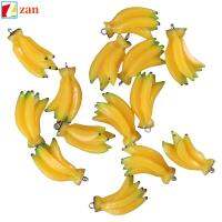 ZAN 20pcs หนา15มิลลิเมตร เครื่องประดับรูปกล้วยขนาดเล็ก เรซิน สีเหลืองทาเล็บ จี้เรซิ่นพร้อมห่วง แข็งแรงและทนทาน กว้าง19มม. อาหารเลียนแบบสีเหลืองน่ารักห้อยเสน่ห์ งานฝีมือดีไอวาย