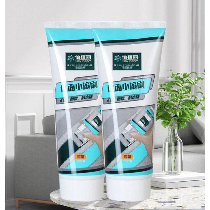 Wall touchup paint roller brush coating to cover small white wall