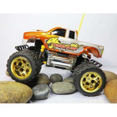 รถบังคับวิทยุ Super Giant 4WD Monster Truck อัตราส่วน 1:16 วิ่งได้ทุกสภาพพื้นผิว มีไฟหน้า – ZONERTOY สีส้ม ล้อทอง