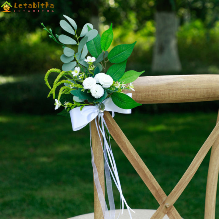 เก้าอี้เทียมด้านหลังดอกไม้หลายสีดอกไม้ทางเดินสำหรับตกแต่งเก้าอี้งานแต่งงานกลางแจ้ง