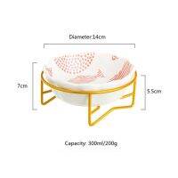 โต๊ะถ้วยชามเซรามิคสัตว์เลี้ยงใหม่ป้องกันกระดูกสันหลังให้สูงอุปกรณ์ชามแพทเทิร์นปลาสุนัขและแมวอุปกรณ์ป้อนอาหารลายการ์ตูนน่ารักอุปกรณ์สำหรับสัตว์เลี้ยง