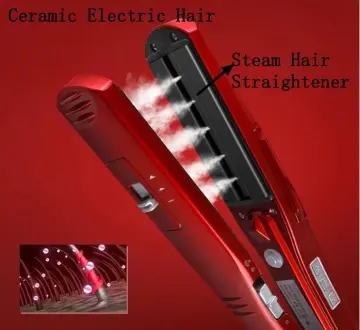 Flat iron with clearance steam and comb