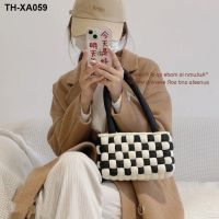 Fat little black and white checkerboard bag handmade diy materials with the bag in the ultra thick Iceland wire mesh bag