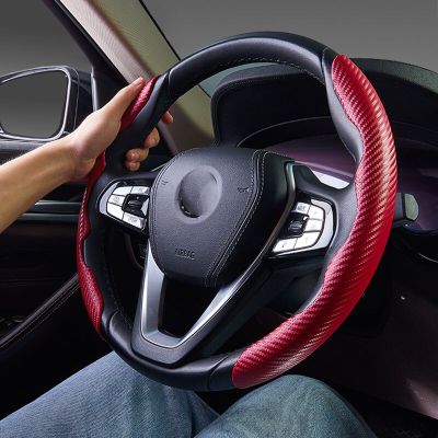 ฝาครอบบูสเตอร์พวงมาลัยรถยนต์ดูคาร์บอนไฟเบอร์สีแดงใหม่1คู่อุปกรณ์เสริมตกแต่งภายในรถกันลื่นอเนกประสงค์