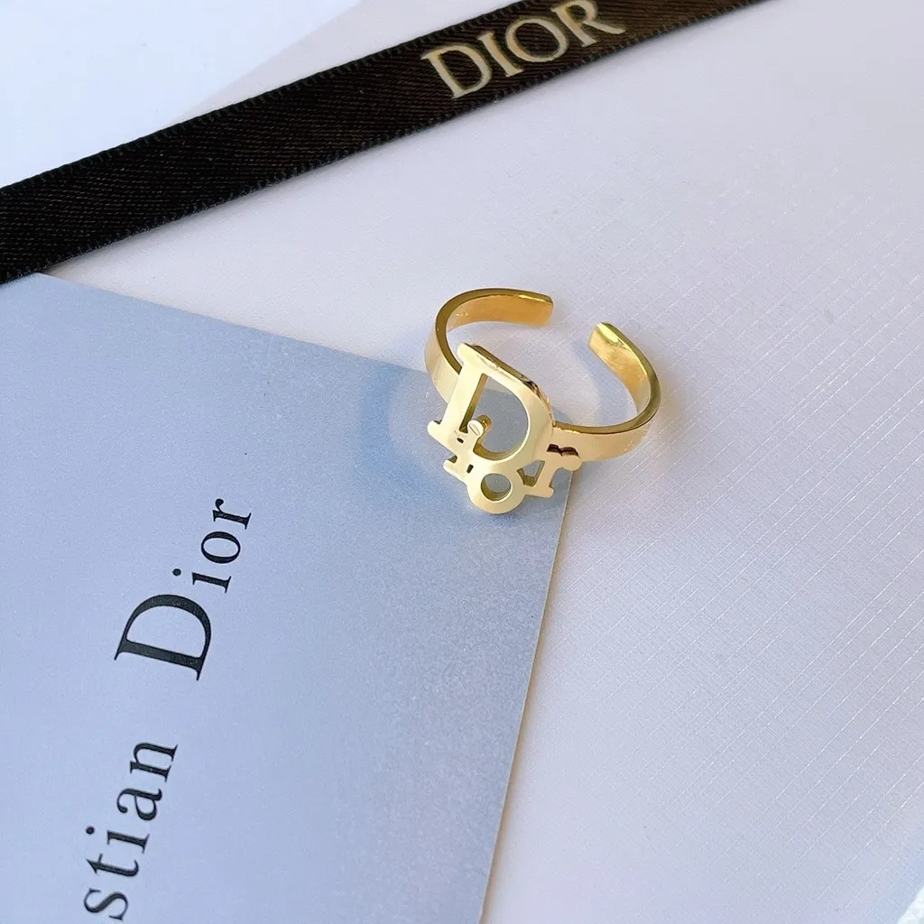 Lot  Signed Christian Dior 1980s diamante D logo goldtone finger ring  hand chain harness