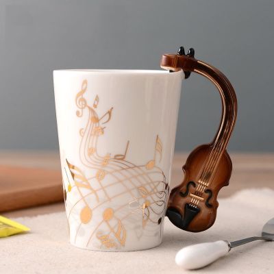 【High-end cups】เซรามิกโกลเด้นโน้ตดนตรีแก้วไวโอลินจับแก้วกาแฟกีตาร์สไตล์ถ้วยและแก้วของขวัญสำหรับคนรักดนตรี