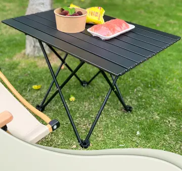 Portable camping table in a online bag