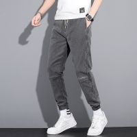 New winter nine division outfit of jeans men handsome han edition of the new foot trousers teenagers popular logo leisure long trousers