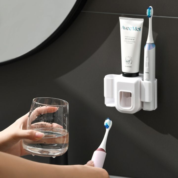 ที่บีบที่รีดยาสีฟันที่ใส่แปรงสีฟันไฟฟ้าอุปกรณ์ยาสีฟันติดผนังห้องน้ำคู่