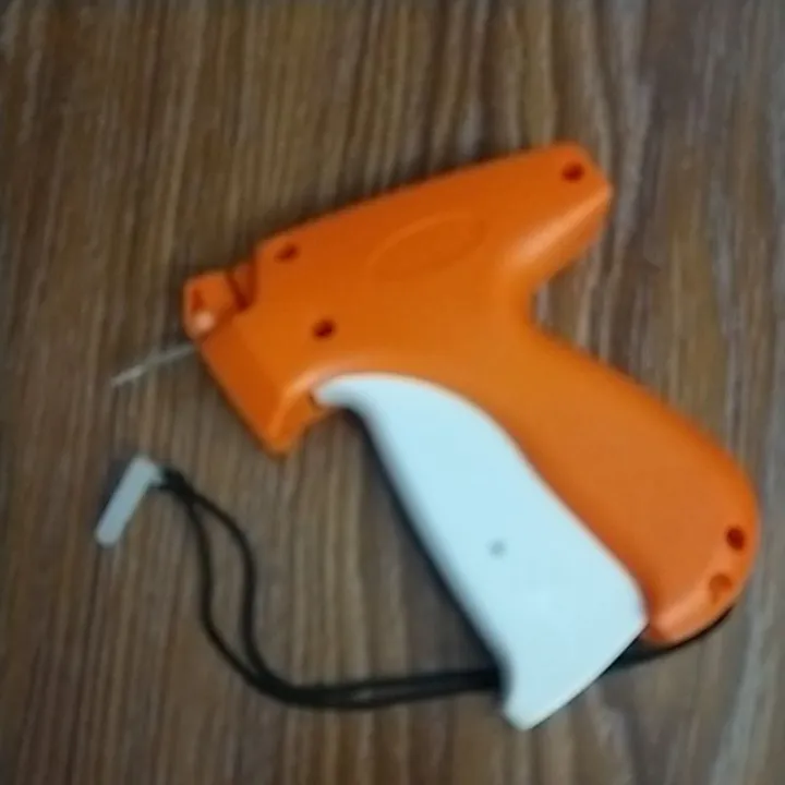 label ☼TAG ATTACHING GUN MPIO free 5 needles Lazada PH
