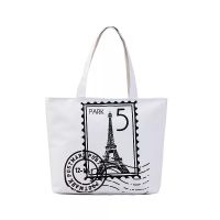 IN THE BAGS กระเป๋าผ้า กระเป๋าผ้าแคนวาสเกรดพรีเมี่ยม มีซิป 2 จุด ลาย Stamp Paris สีขาว