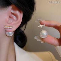 ? เครื่องประดับ S925 silver needle light luxury niche senior design feeling after hanging a pearl earring female ins boom two wear earrings