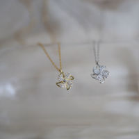 Yuki S Gold สีจี้รูปทรงกังหันสร้อยคอ AAA Cubic Zirconia Pave ไทเทเนียมสร้อยคอคริสตัลสำหรับผู้หญิงผู้ชายแฟชั่นเครื่องประดับของขวัญ