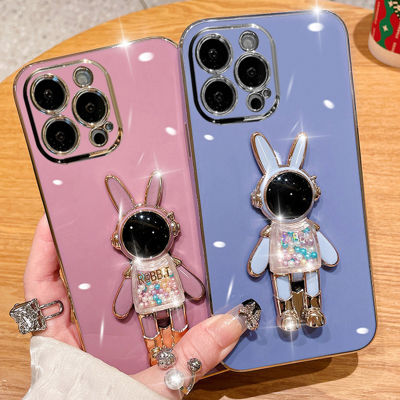 เคสโทรศัพท์ตัวชุบโลหะหรูหรา JieFie สำหรับ iPhone 14 Pro Max 13 Pro Max 12 Pro Max 11 Pro Max 6S Plus 7 8 Plus XR X XS Max เคสนักอวกาศของเล่นกระต่ายน่ารักฝาครอบโทรศัพท์ TPU แบบน่มสี่เหลี่ยม + ขาตั้ง