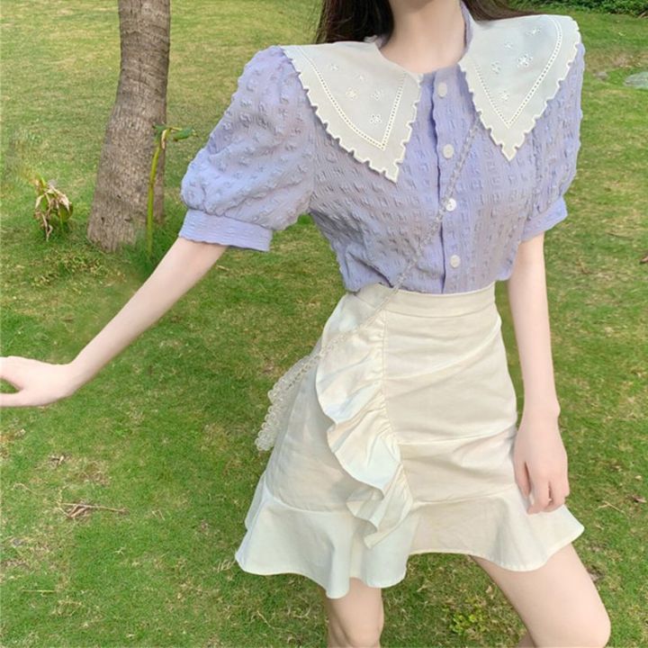 เสื้อสตรีฤดูร้อนเกาหลีกลวงย้อนยุคเสื้อแขนพัฟสีม่วงตุ๊กตาปกเก๋ไก๋