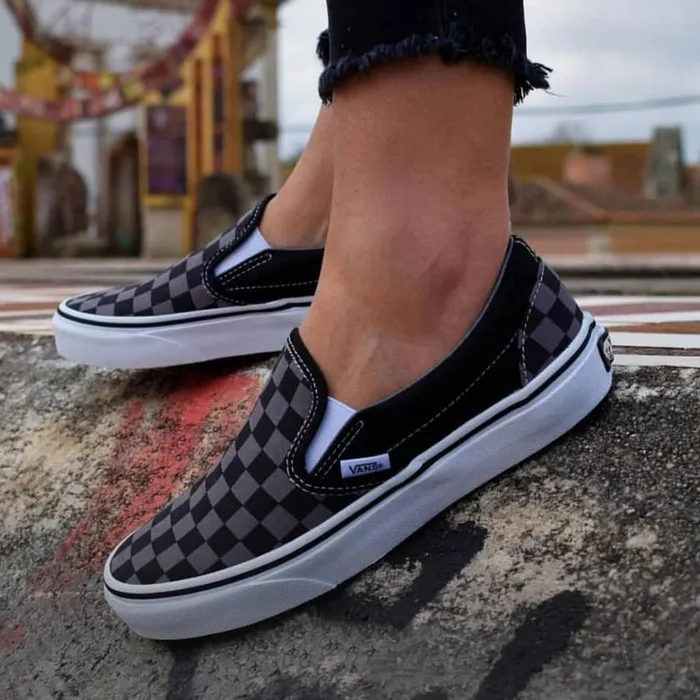 checkerboard and black vans