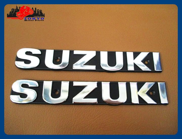 suzuki-gp100-a100-gt185-gt250-gt380-gt550-side-fuel-tank-emblem-chrome-sticker-size-17x2-5-cm-2-pcs-สติ๊กเกอร์-ข้อความ-suzuki-สีโครเมี่ยม