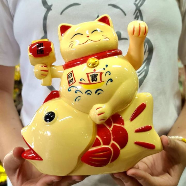 แมว-แมวกวัก-แมวนำโชค-แมวยืนปลา-แมวญี่ปุ่น-เเมวกวักจีน-แมวกวักใส่ถ่าน-สี-เงิน-ทอง-ขาว-เหลืองครีม-พร้อมส่ง