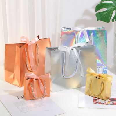 Laser gift paper bag holiday party gold and silver packaging carton ribbon small paper bag can be customized size printed logo Gift Wrapping  Bags