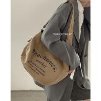 2023 New khaki Korean version of canvas bag female student alphabet retro crossbody bag everything single shoulder bag