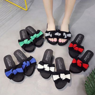 Wear high heels outside the thick with slippers female summer fashion wedges bowknot word procrastinates 2021 new large base beach sandals