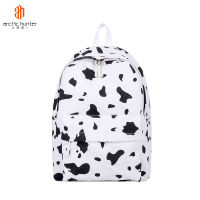 ARCTIC HUNTER กระเป๋านักเรียน กระเป๋านรมัธยม กระเป๋าเป้ผ้าใบลายวัว,กระเป๋านักเรียนน่ารักสีดำจุดสีตัดกัน