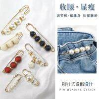 waist brooch waistband is surrounded a tightening at the artifact jeans suspenders pins exposed