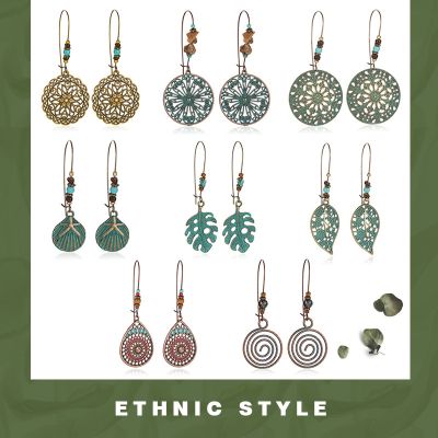 [COD] Ethnic style fashion earrings ancient bronze exaggerated carved bohemian retro green plant element