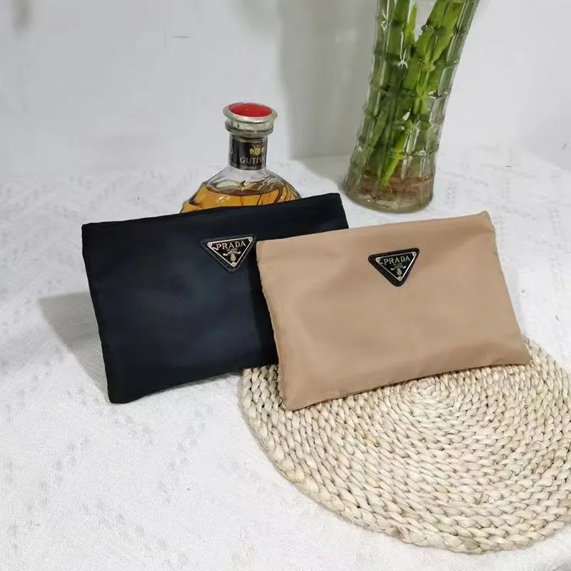 New Prada Clutch Bag Triangle P Letter Washing Bag Cosmetic Bag Storage Bag  Waterproof, Simple and Stylish, Large Capacity and Hand In Hand with The Bag.  