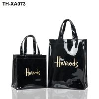 The new tote bag shoulder hand bag leisure to receive alphabet book Europe and the waterproof