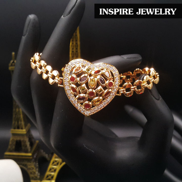 inspire-jewelry-สร้อยข้อมือกึ่งกำไล-ฝังพลอยนพเก้า-และล้อมด้วยฝังเพชรสวิส-สวยงามมาก-งานแฟชั่นชั้นนำ