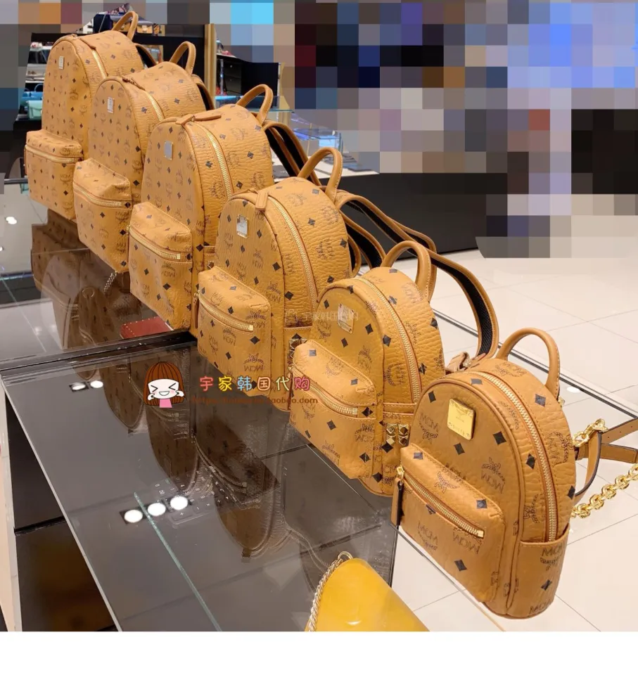 Mcm backpack small Yujia Korea generation new side nail rivet smog powder  gold white schoolbag purchase.