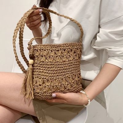 National wind Sue straw bag female 2022 new hollow woven bag leisure beach one shoulder inclined shoulder bag