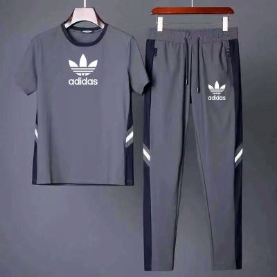 【ของแท้อย่างเป็นทางการ】กระเป๋าadidas official store หนังสือที่ขายดีที่สุดสำหรับผู้ชายผ้าไหมน้ำแข็งแขนสั้นเสื้อยืดชุดฤดูร้อนกีฬาบริการอย่างร