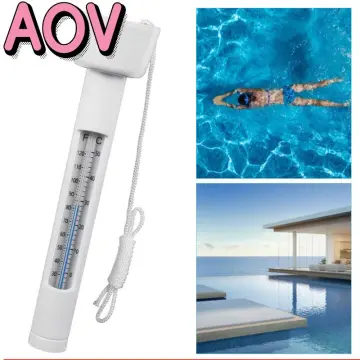 Reading a water thermometer in swimming pool, checking water