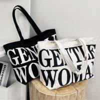 (w220)กระเป๋าผ้าแคสวาส สกรีนgetle woman ใบใหญ่