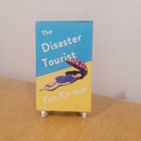 (ส่งฟรี) The Disaster Tourist