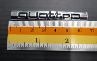 Logo quattro งานพลาสติกขนาด 6.5 cm สีดำ เงิน