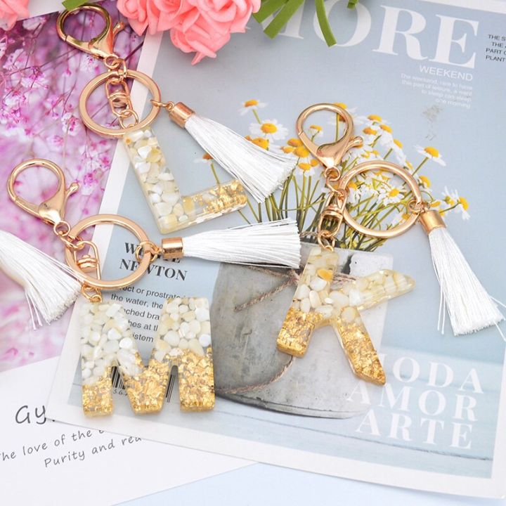 white-tassel-gold-color-foil-letter-keychain-english-words-keyring-glitter-gradient-resin-crafts-gold-leaf-car-handbag-pendant-key-chains