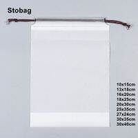 Stobag ถุงรูดสำหรับใส่เสื้อผ้าขุ่นใส50ชิ้นกระเป๋าเดินทางจัดเก็บรองเท้าโลโก้กระเป๋ากันน้ำสำหรับสัตว์