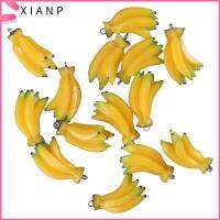 XIANP 20pcs กว้าง19มม. เครื่องประดับรูปกล้วยขนาดเล็ก สีเหลืองทาเล็บ หนา15มิลลิเมตร เลียนแบบอาหารกล้วยผลไม้สีเหลือง Micro Model Charms ง่ายต่อการพกพา เรซิน เครื่องลางเรซิ่นกล้วยผลไม้ งานฝีมือดีไอวาย